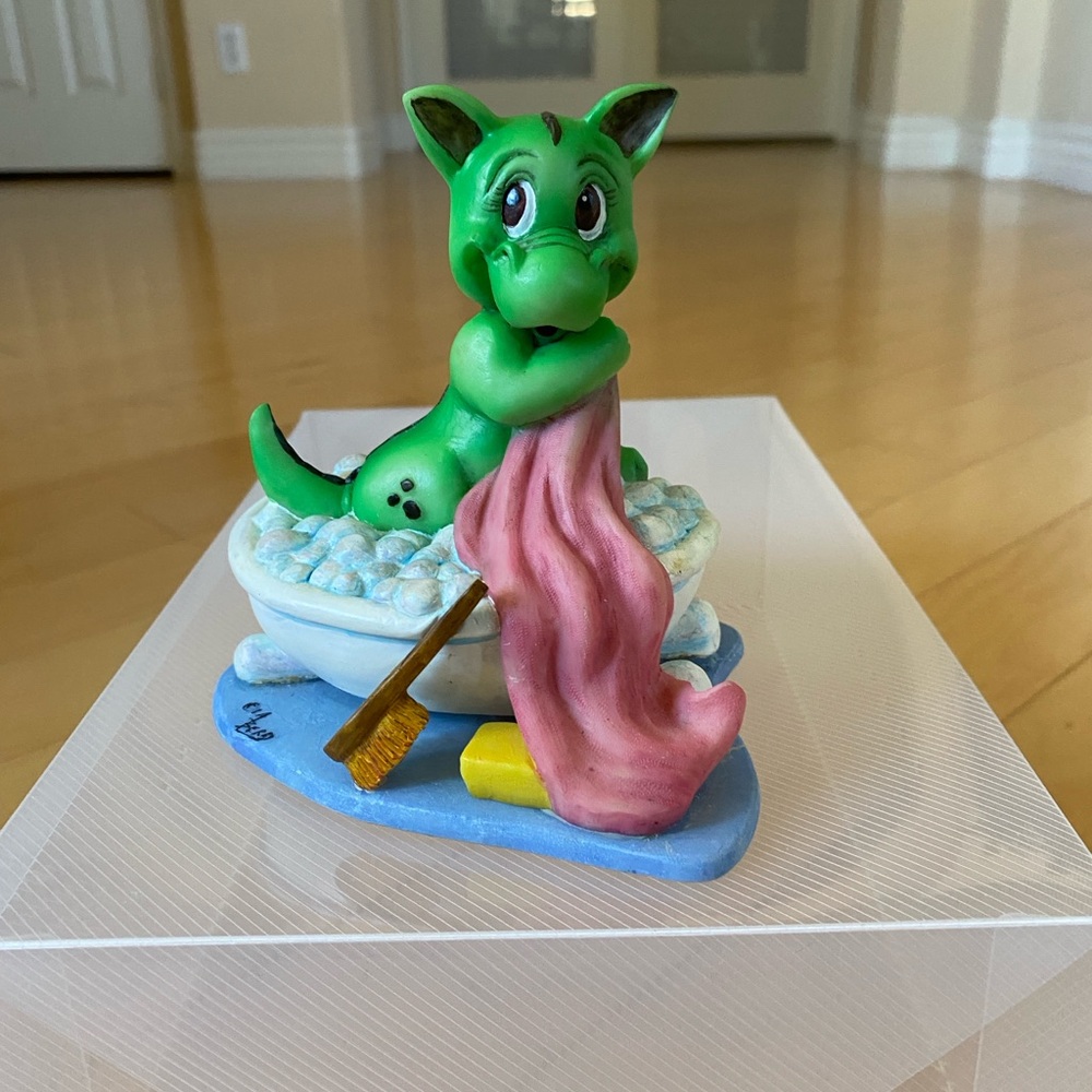 Charming Green Dragon Figurine with Pink Towel